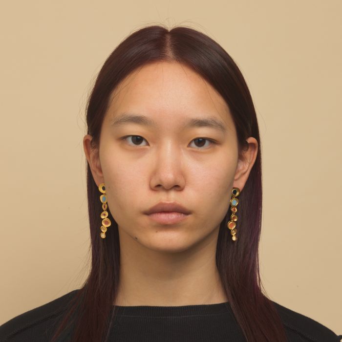 Golden colour long earrings discount