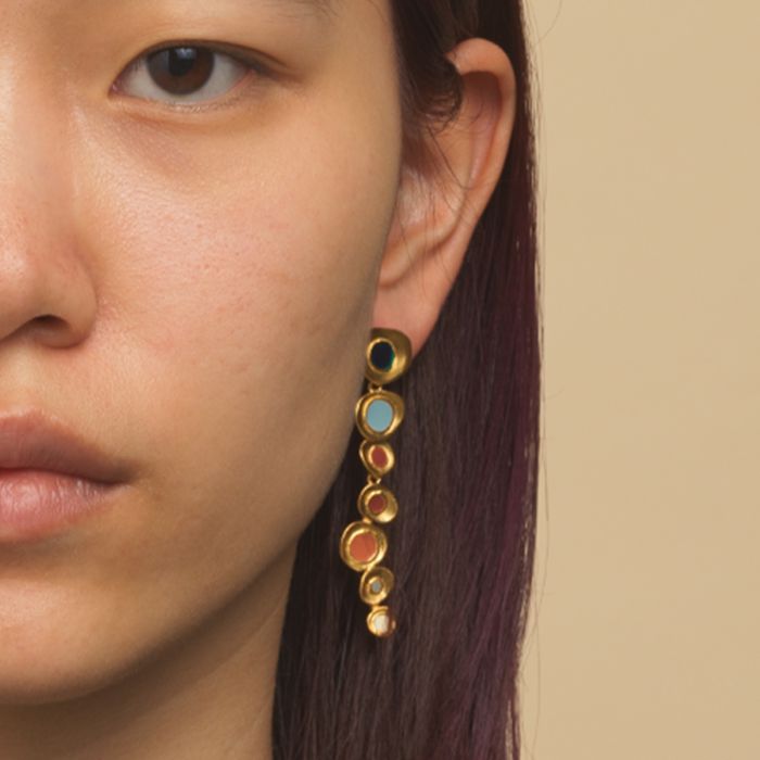 Golden colour long earrings on sale